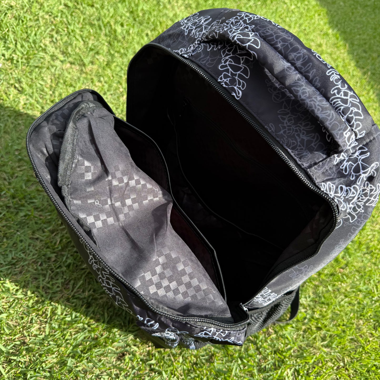 Black Puakenikeni Waterproof Backpack♡
